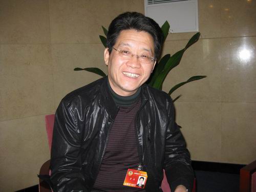 政協(xié)委員、新華社解放軍分社社長(zhǎng)賈永人民網(wǎng)記者崔燦攝